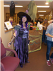 A woman dressed as a witch