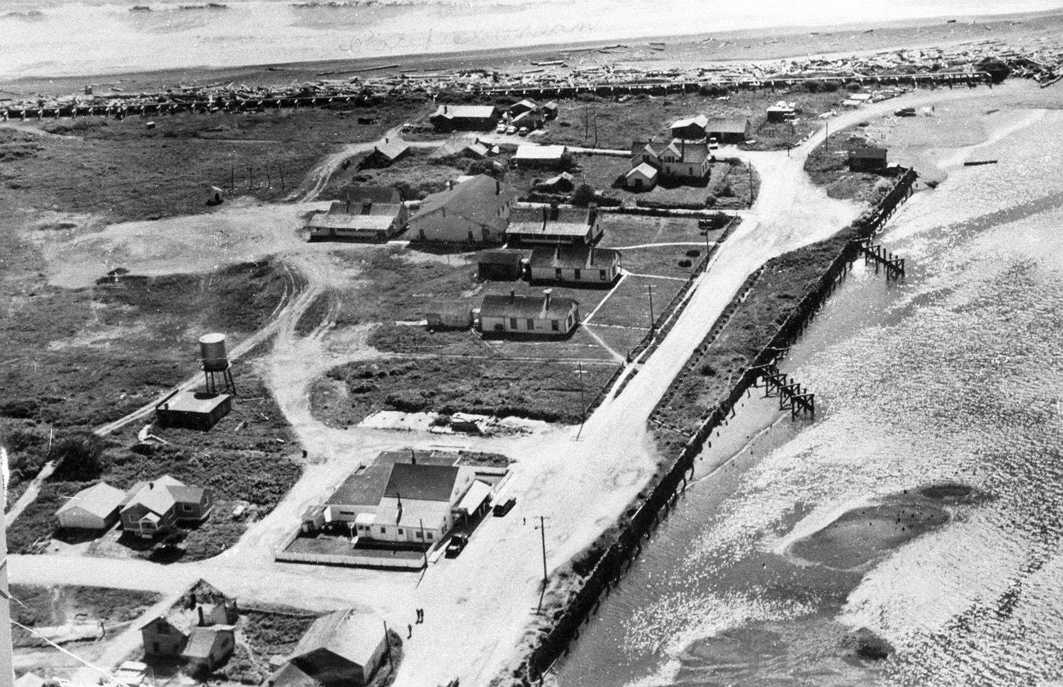 Black and white aerial view of past Taholah
