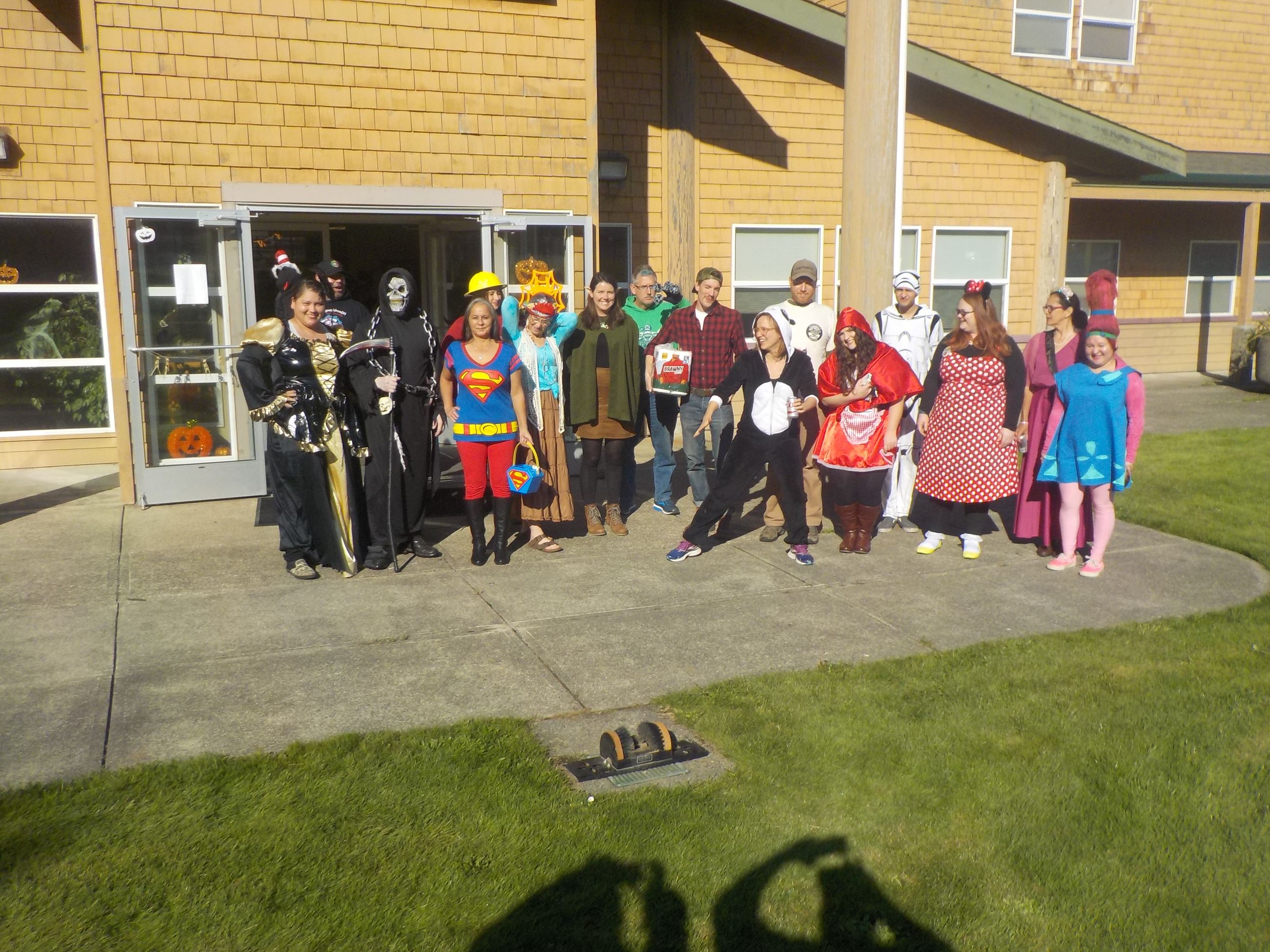 People in costume posing for pictures