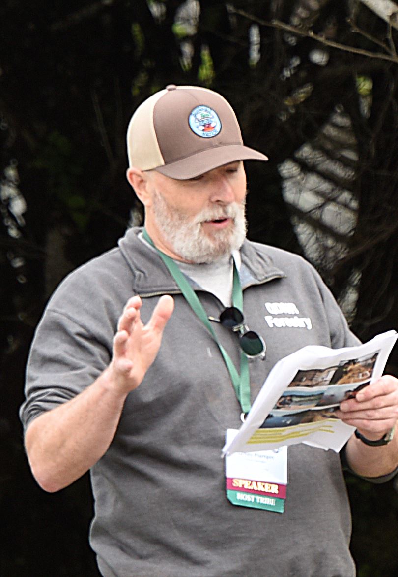 A man reads a pamphlet