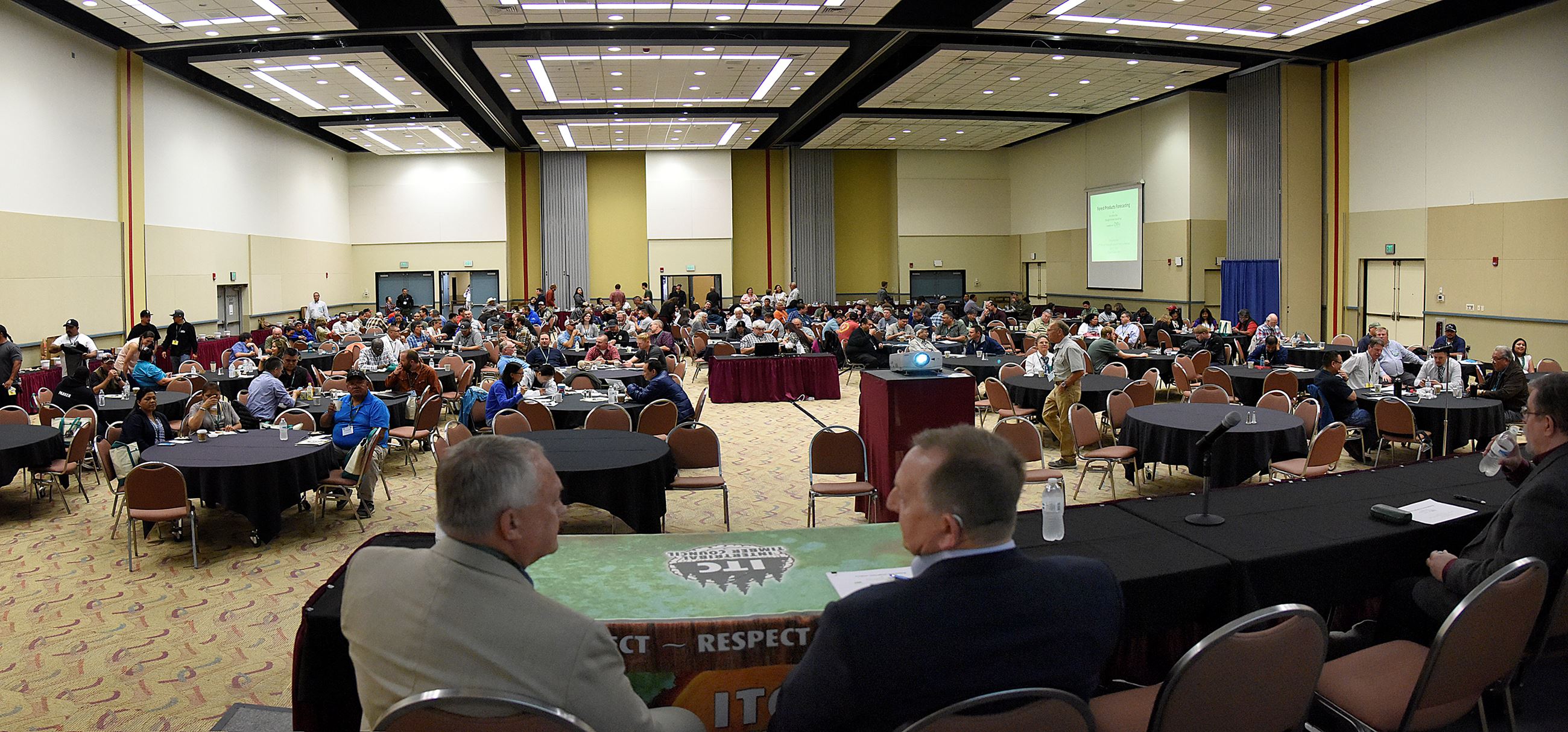 A group of people in a conference room