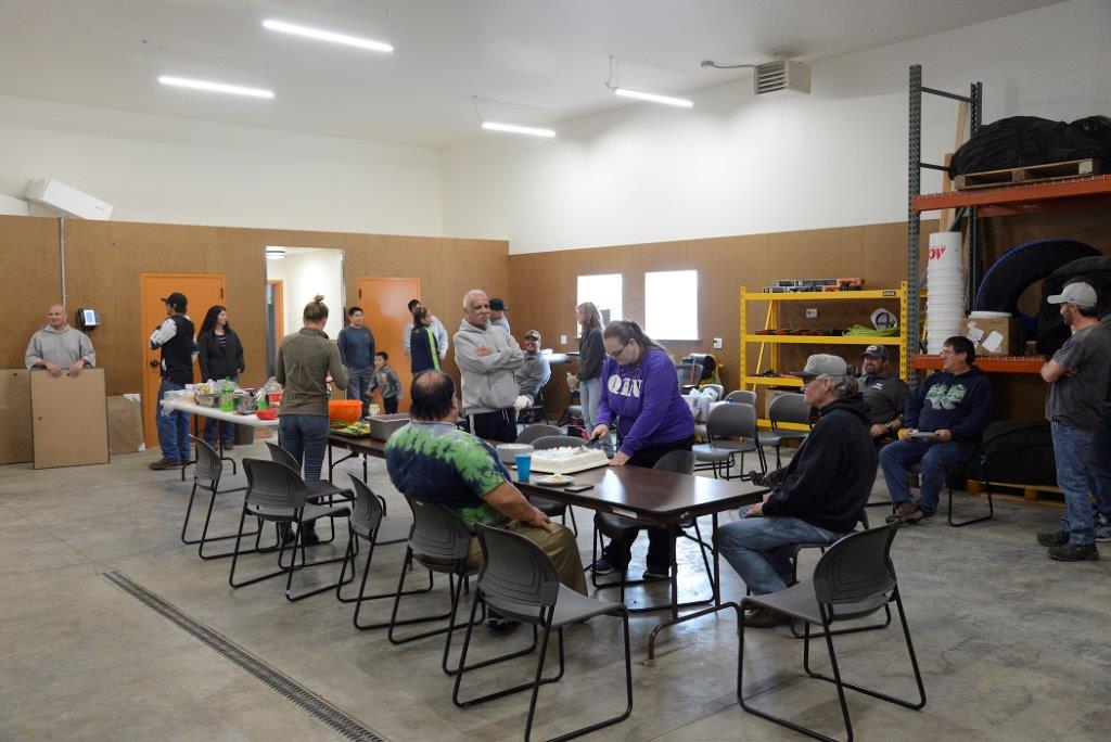 A woman cutting cake