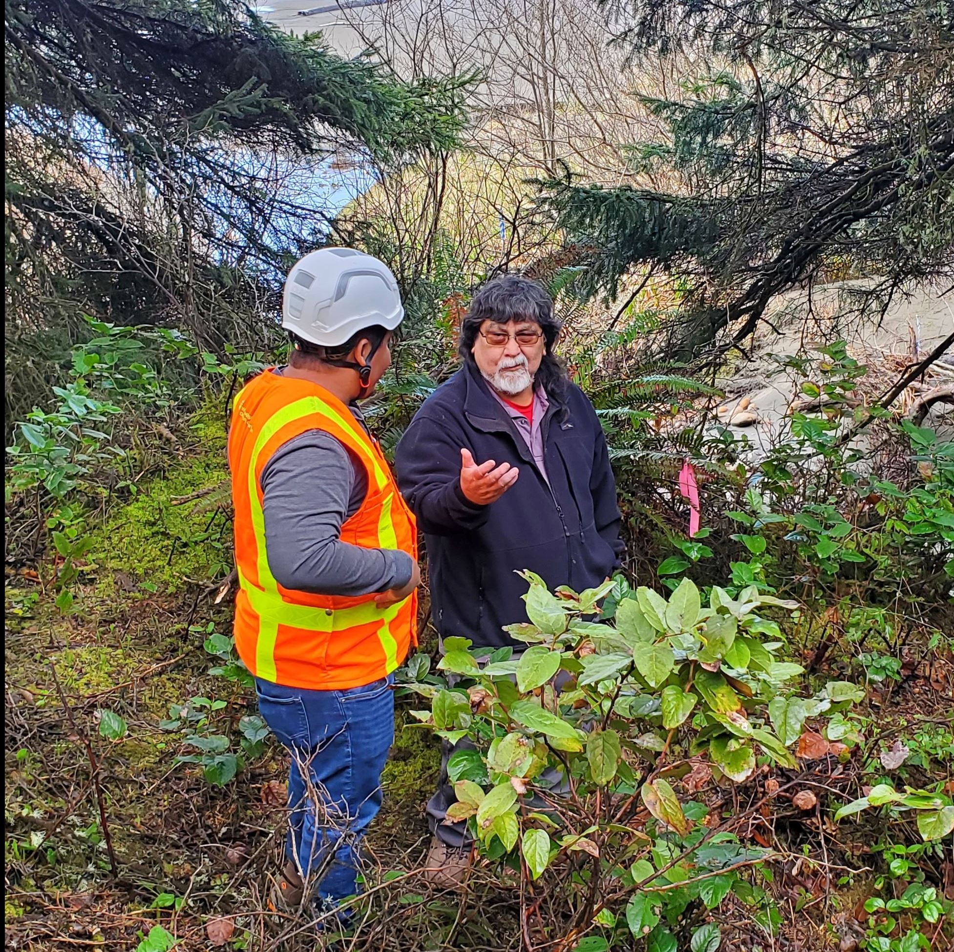 2 people having a conversation outside